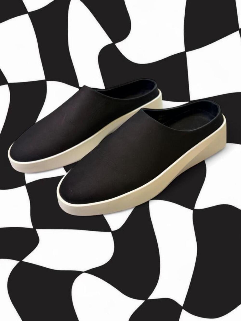 Wolf & Shephard slip-on mules with white sole